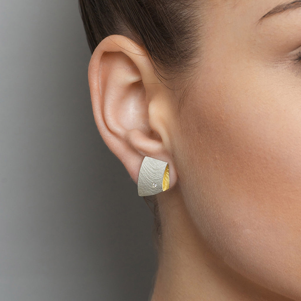 Photograph 2 of Manu's Contemporary Sterling Silver 22k Yellow Gold Bi-Metal Fold Over Diamond Statement Earrings. Available on DESIGNYARD.com and in our Jewellery Shop Dublin, Ireland. Free Worldwide Shipping with DHL.