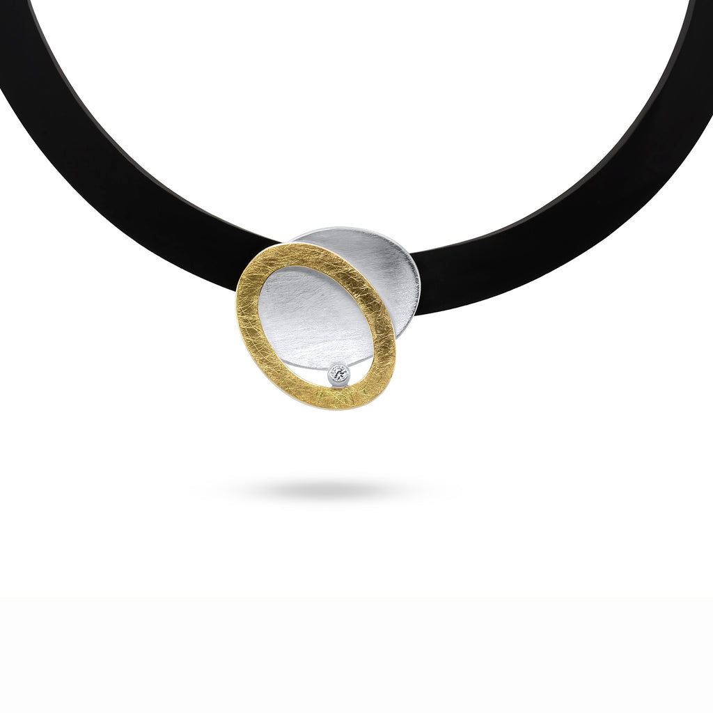 Photograph 1 of Manu's Contemporary Sterling Silver 22k Yellow Gold Bi-metal Intertwined Diamond Necklace. Available on DESIGNYARD.com and in our Jewellery Shop Dublin, Ireland. Free Worldwide Shipping with DHL.
