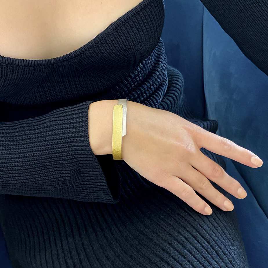 Photograph 2 of Manu's Contemporary Sterling Silver 22k Yellow Gold Layered Bangle. Available on DESIGNYARD.com and in our Jewellery Shop Dublin, Ireland. Free Worldwide Shipping with DHL.