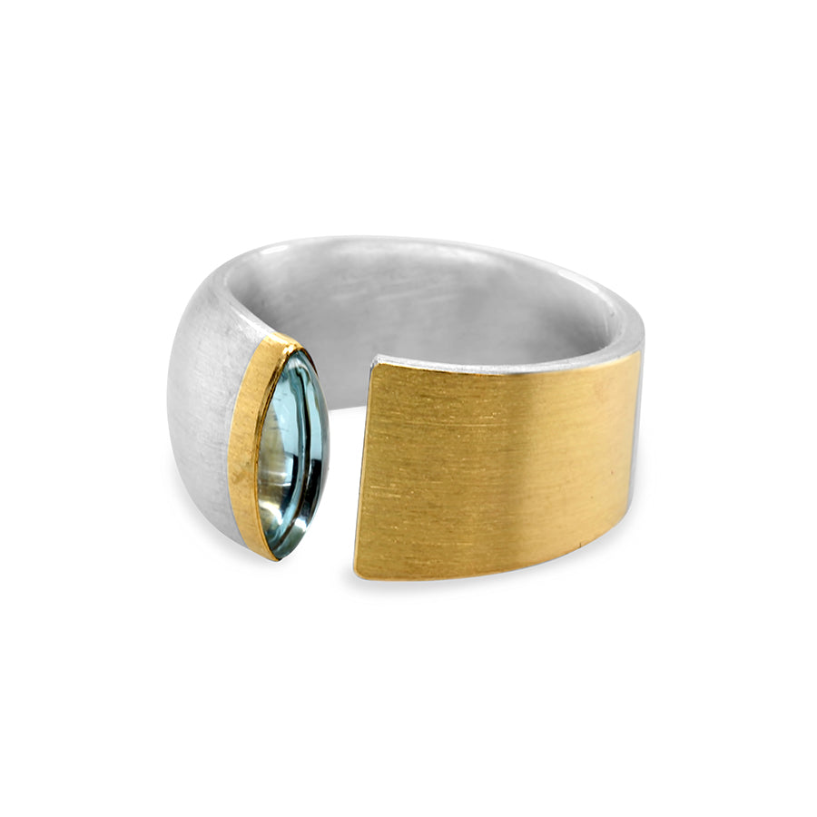 Photograph 1 of Manu's Contemporary Sterling Silver 22k Yellow Gold Navette Blue Topaz Open Band Ring. Available on DESIGNYARD.com and in our Jewellery Shop Dublin, Ireland.
