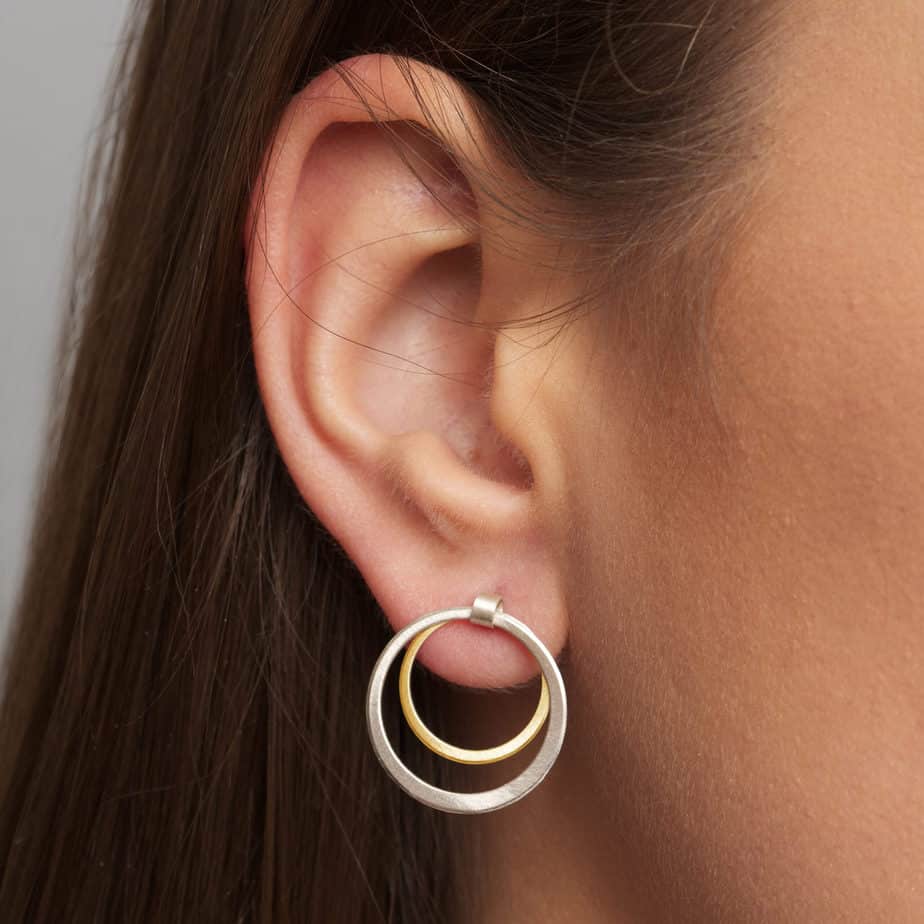 Photograph 2 of Manu's Contemporary Sterling Silver 22k Yellow Gold Bi-Metal Hoop Earrings. Available on DESIGNYARD.com and in our Jewellery Shop Dublin, Ireland. Free Worldwide Shipping with DHL.