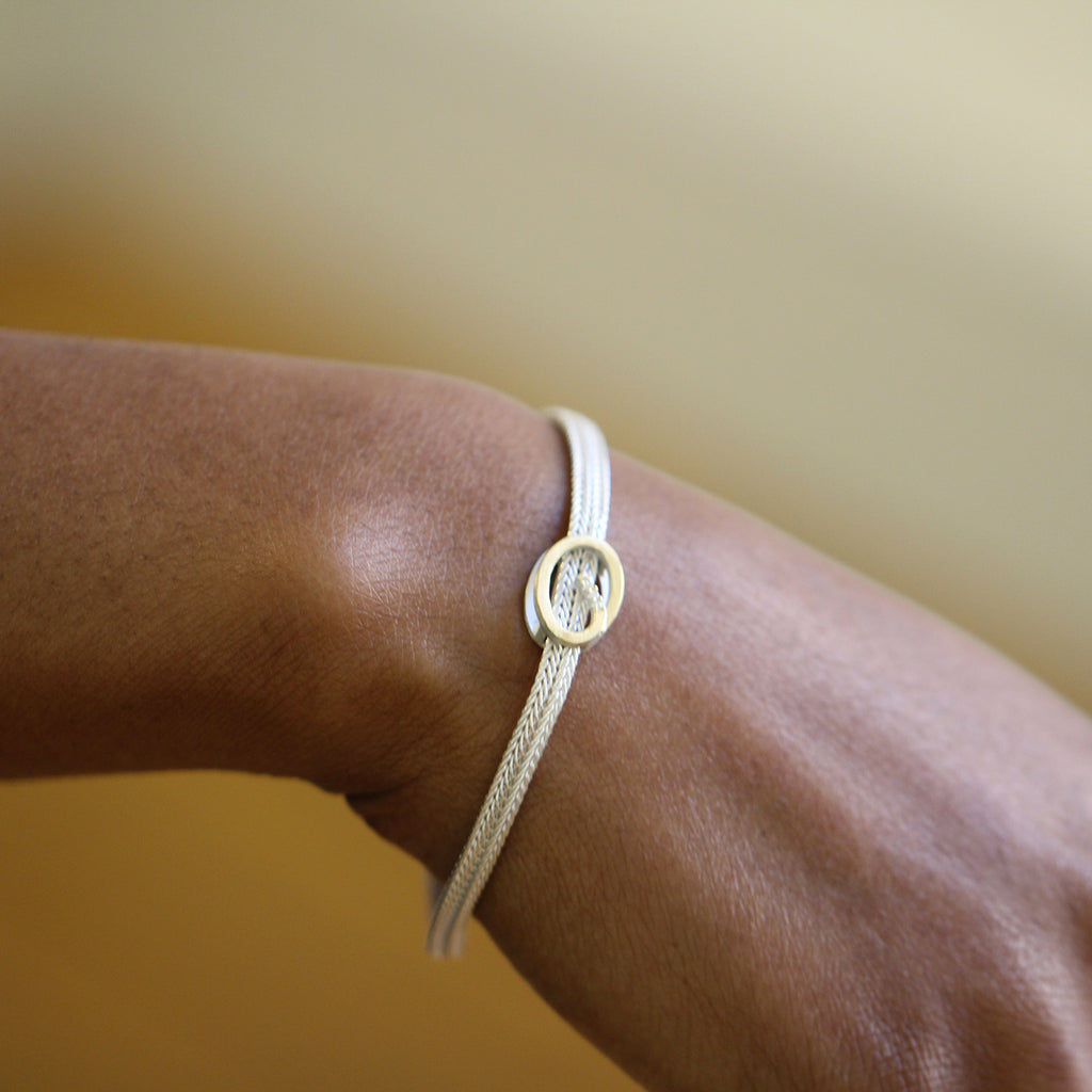 Photograph 2 of Manu's Contemporary Sterling Silver 22k Yellow Gold Swirl Diamond Bracelet. Available on DESIGNYARD.com and  in our Jewellery Shop Dublin, Ireland. Free Worldwide Shipping with DHL.