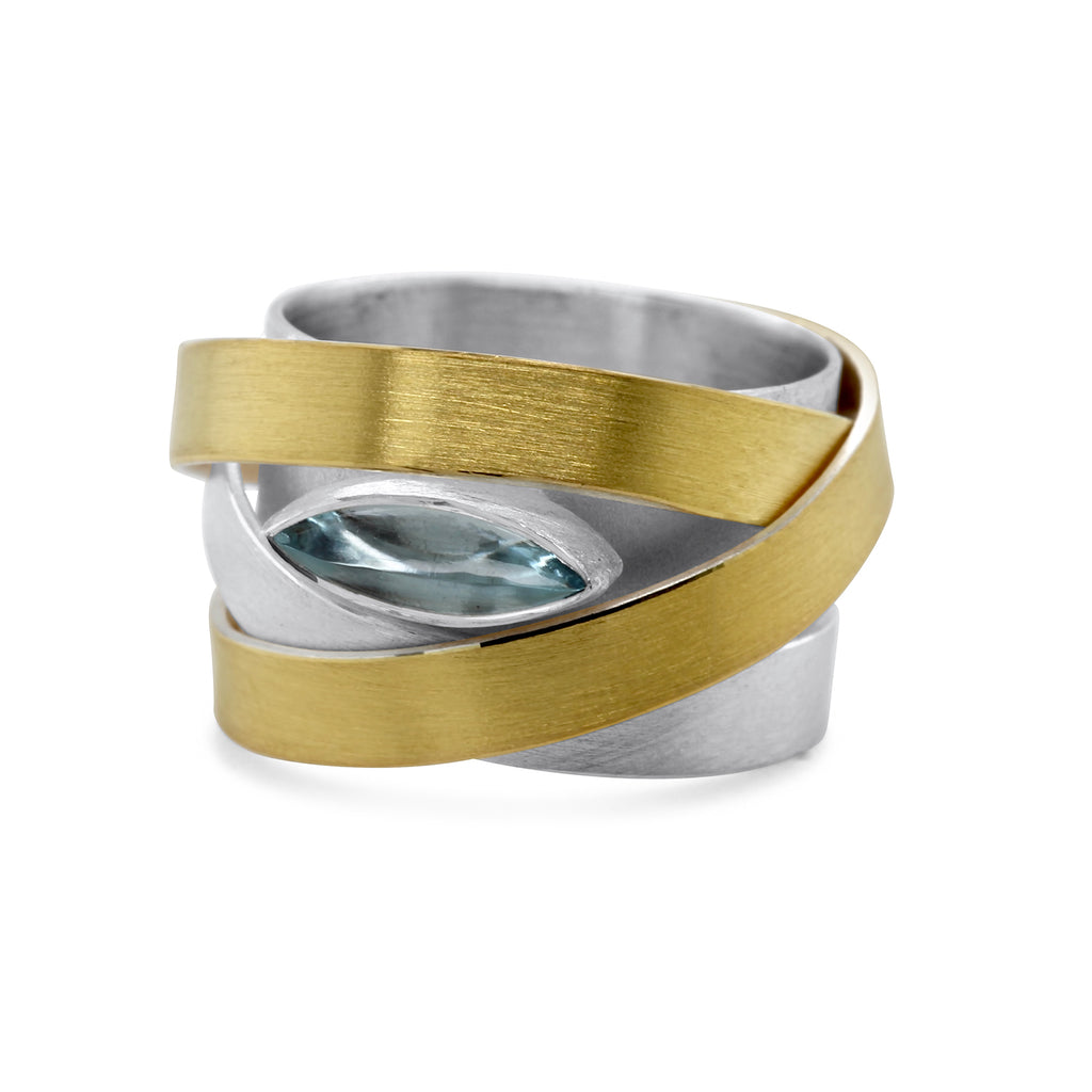 Photograph 1 of Manu's Contemporary Sterling Silver 22k Yellow Gold Topaz Ribbon Ring. Available on DESIGNYARD.com and in our Jewelry Store Dublin, Ireland.