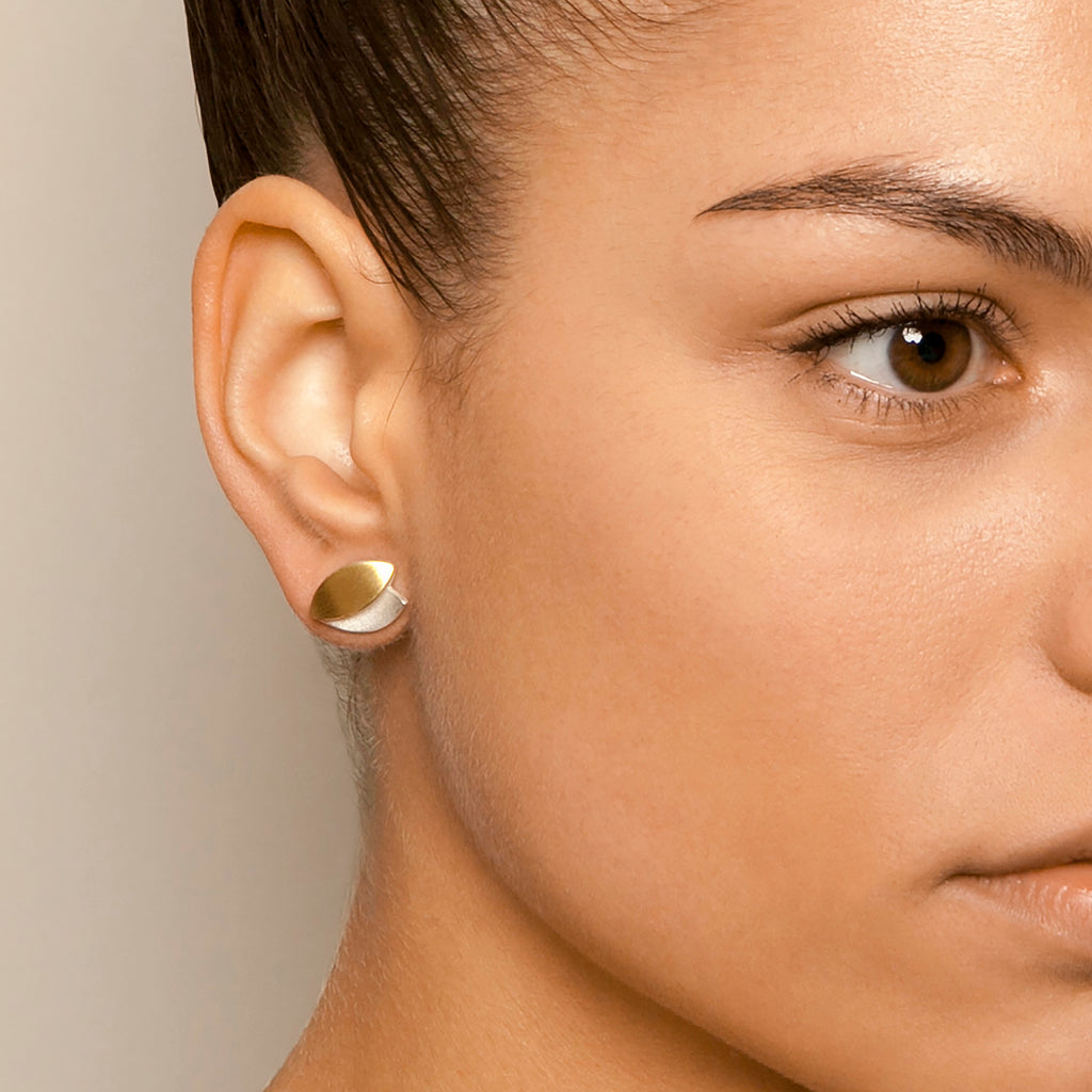 Photograph 2 of Manu's Contemporary Sterling Silver 22k Yellow Gold Leaf Earrings. Available on DESIGNYARD.com and in our Jewelry Store Dublin, Ireland. Free Worldwide Shipping with DHL.