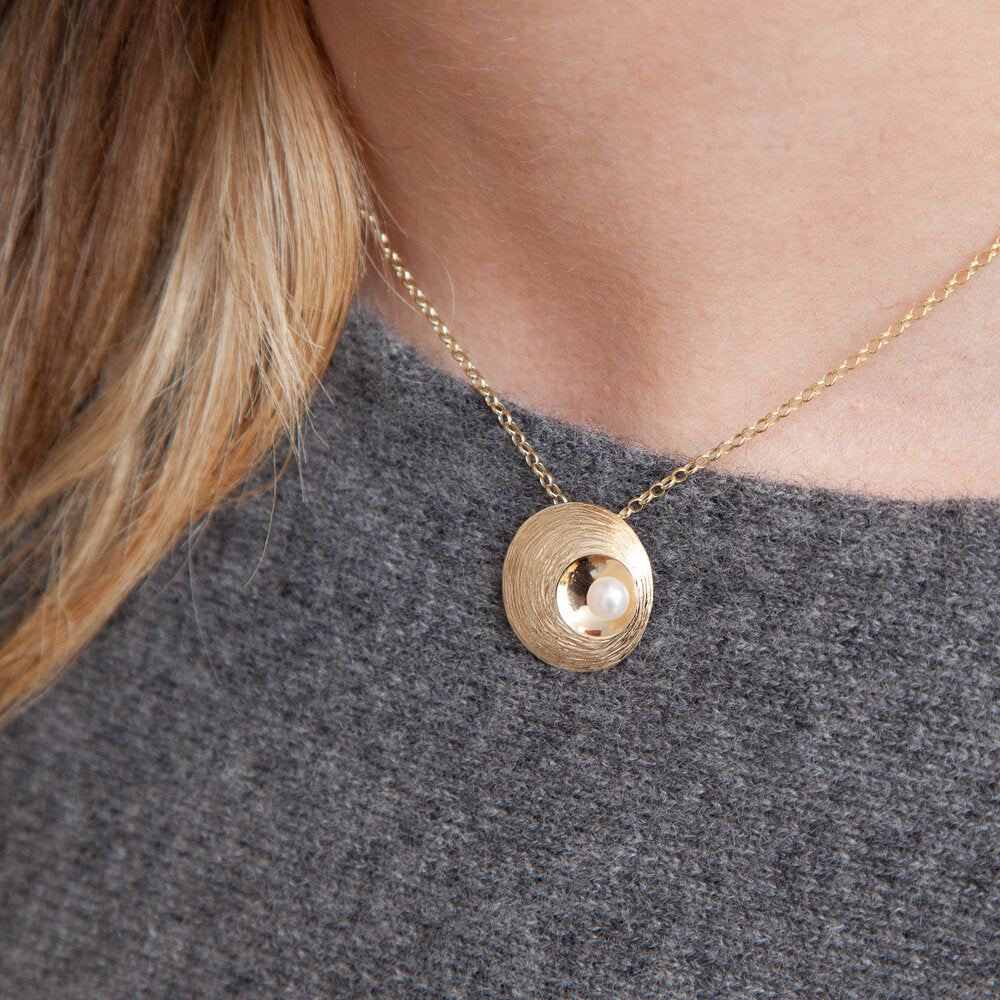 Photograph 2 of Martina Hamilton's Contemporary Yellow Gold Oyster Pearl Pendant. Available on DESIGNYARD.com and in our Jewelry Shop Dublin, Ireland. Free Worldwide Shipping with DHL.