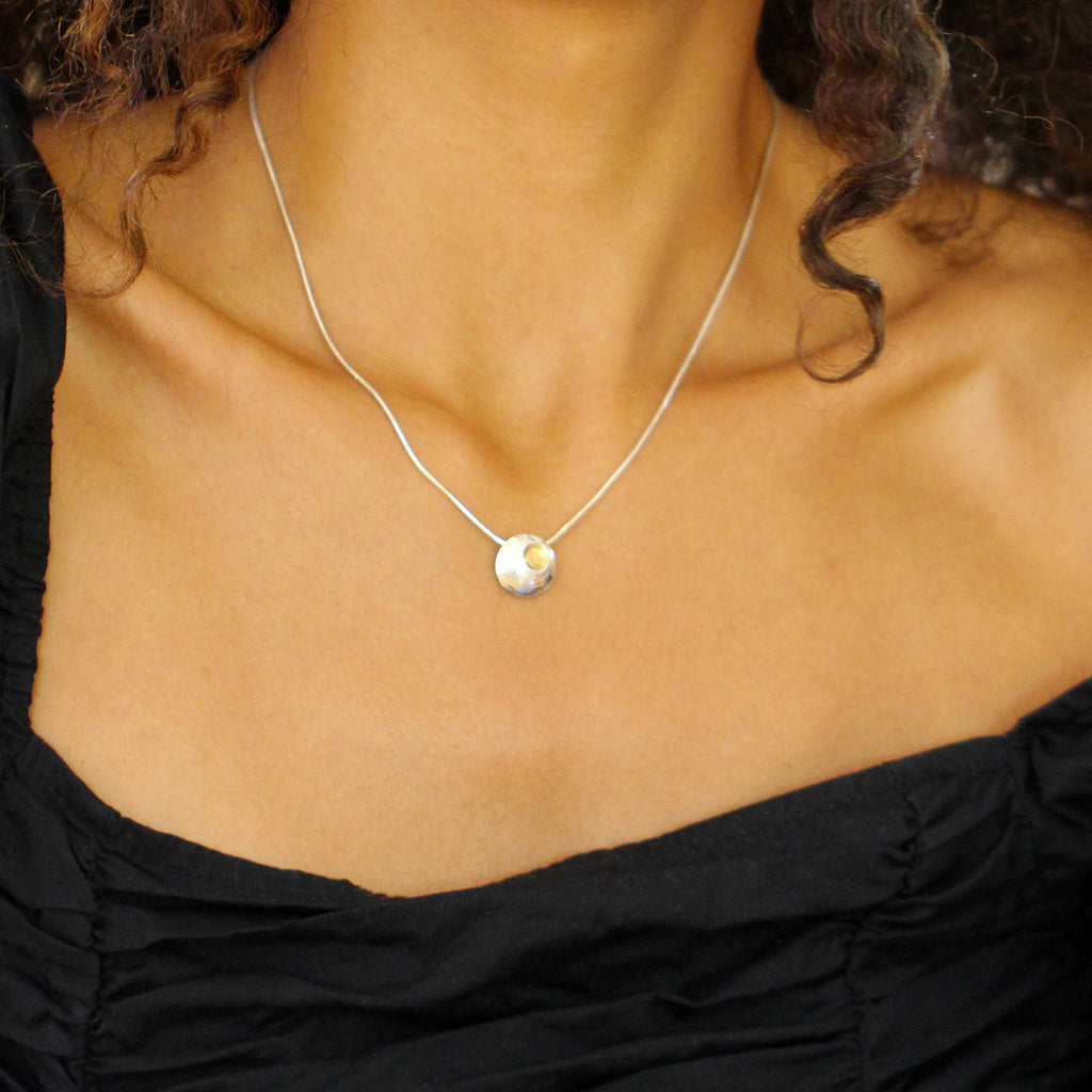 Photograph 4 of Martina Hamilton's Contemporary Sterling Silver Moon Shell Pendant. Available on DESIGNYARD.com and in our Jewellery Shop Dublin, Ireland.