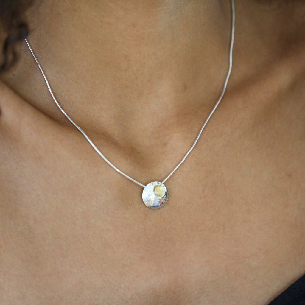 Photograph 3 of Martina Hamilton's Contemporary Sterling Silver Moon Shell Pendant. Available on DESIGNYARD.com and in our Jewellery Shop Dublin, Ireland.