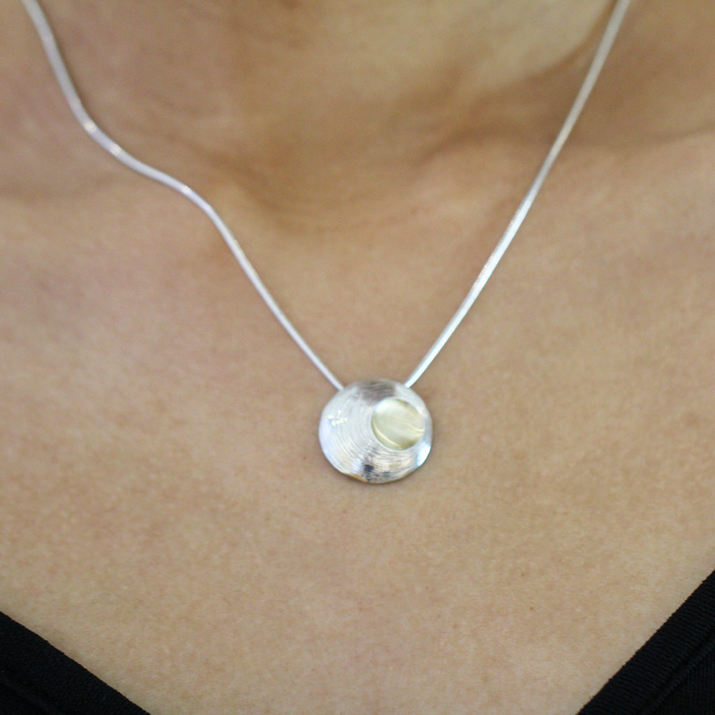 Photograph 2 of Martina Hamilton's Contemporary Sterling Silver Moon Shell Pendant. Available on DESIGNYARD.com and in our Jewellery Shop Dublin, Ireland.
