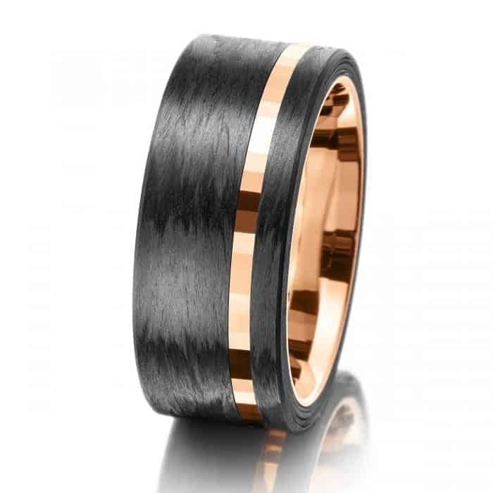 Photograph 1 of Meister's Contemporary Men's 18k Rose Gold Carbon Fibre Wedding Ring. Available on DESIGNYARD.com and in our Jewellery Shop Dublin, Ireland. Free Worldwide Shipping with DHL.