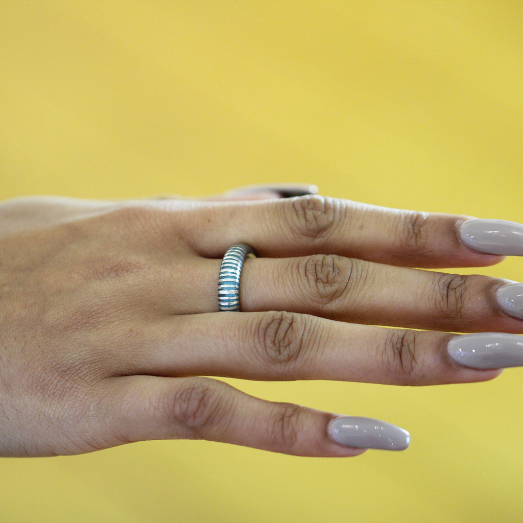 Photograph 2 of Monika Jakubec's Contemporary Silver Aqua Resin Cebra Statement Ring. Available on DESIGNYARD.com and in our Jewellery Shop Dublin, Ireland. Free Worldwide Shipping with DHL.