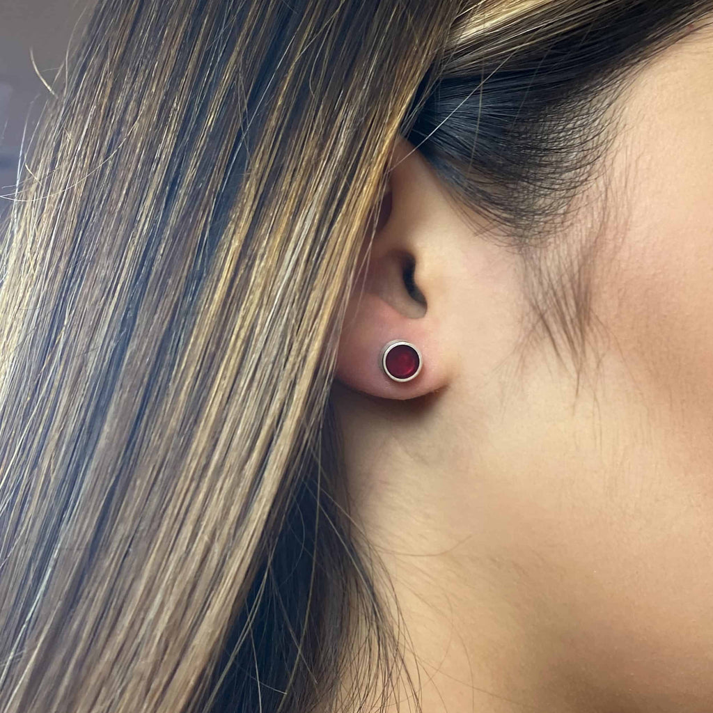 Photograph 2 of Monika Jakubec's Contemporary Silver Red Resin Round Micro Stud Earrings. Available on DESIGNYARD.com and in our Jewellery Shop Dublin, Ireland. Free Worldwide Shipping with DHL.