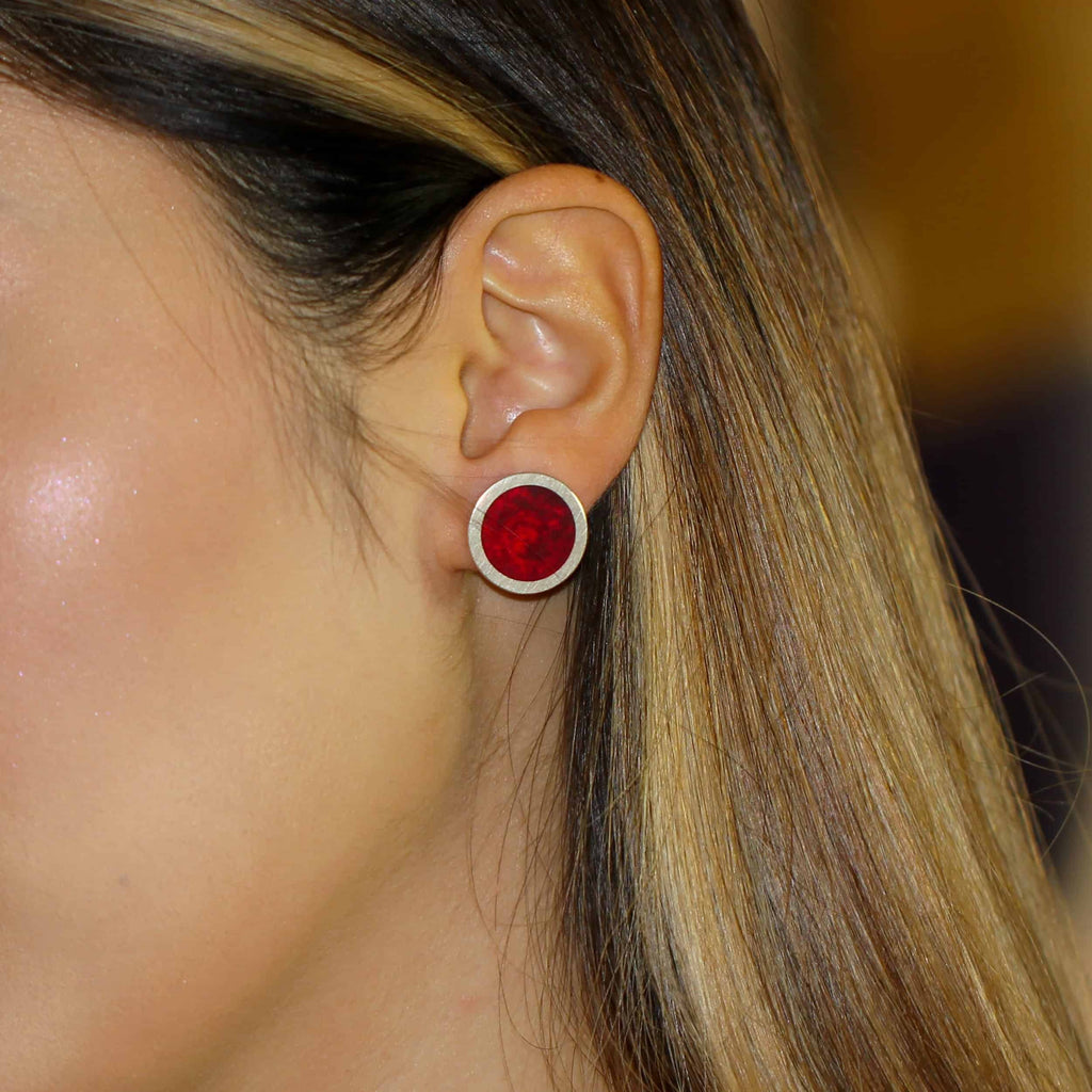 Photograph 2 of Monika Jakubec's Contemporary Silver Red Resin Round Stud Statement Earrings. Available on DESIGNYARD.com and in our Jewellery Shop Dublin, Ireland. Free Worldwide Shipping with DHL.