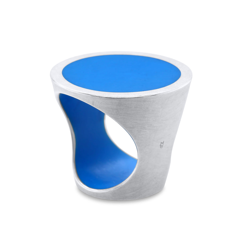 Photograph 1 of Monika Jakubec's Contemporary Silver Sky Blue Resin Cone Statement Ring. Available on  DESIGNYARD.com and in our Jewellery Shop Dublin, Ireland. Free Worldwide Shipping with DHL.