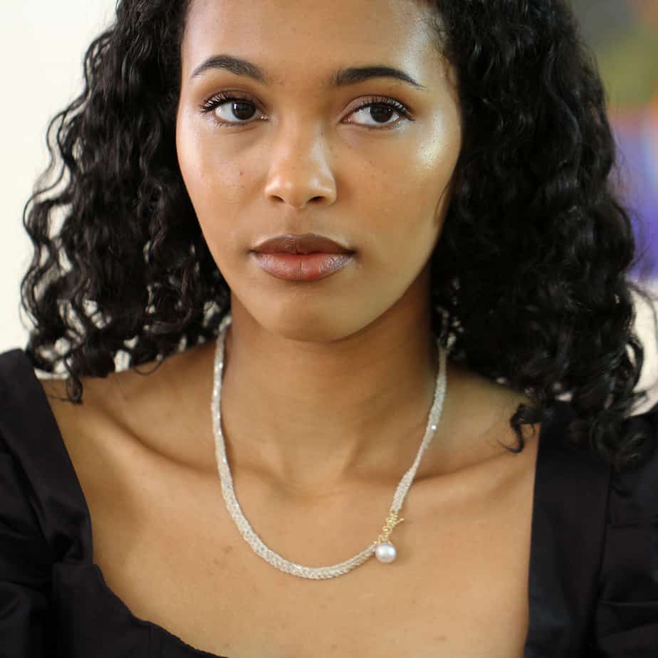 Photograph 2 of Myriam Oude Vrielink's Sterling Silver 14k Yellow Gold Pearl Ribbon Necklace. Available on  DESIGNYARD.com and in our Contemporary Jewellery Shop Dublin, Ireland. #1 for Contemporary Jewellery.