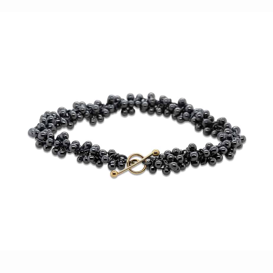 Photograph 1 of Neeltje Huddleston Slater's Contemporary Fine Oxidised Silver 14k Yellow Gold Double Beaded Bracelet. Available on DESIGNYARD.com and in our Jewellery Shop Dublin, Ireland. Free Worldwide Shipping with DHL.