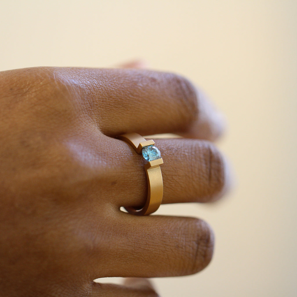 Photograph 4 of Niessing's Contemporary 18k Fine Rose Gold Spannring® Highend C Ocean Blue Diamond Engagement Ring. Available on DESIGNYARD.com and in our Jewellery Shop Dublin, Ireland. Free Worldwide Shipping with DHL.