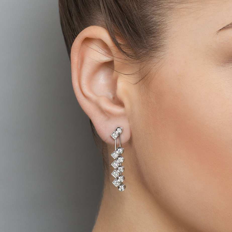 Photograph 2 of Ronan Campbell's Contemporary Elegant 18k White Gold Diamond Dance Drop Statement Earrings. Available on DESIGNYARD.com and in our Jewellery Shop Dublin, Ireland. Free Worldwide Shipping with DHL.