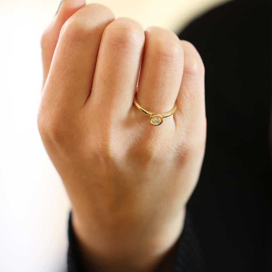 Photograph 4 of Ronan Campbell's 18k Yellow Gold Mēdēəm Bezəl Round Diamond Engagement Ring. Available on DESIGNYARD.com and in our Jewellery Shop Dublin, Ireland. Free Worldwide Shipping with DHL. 