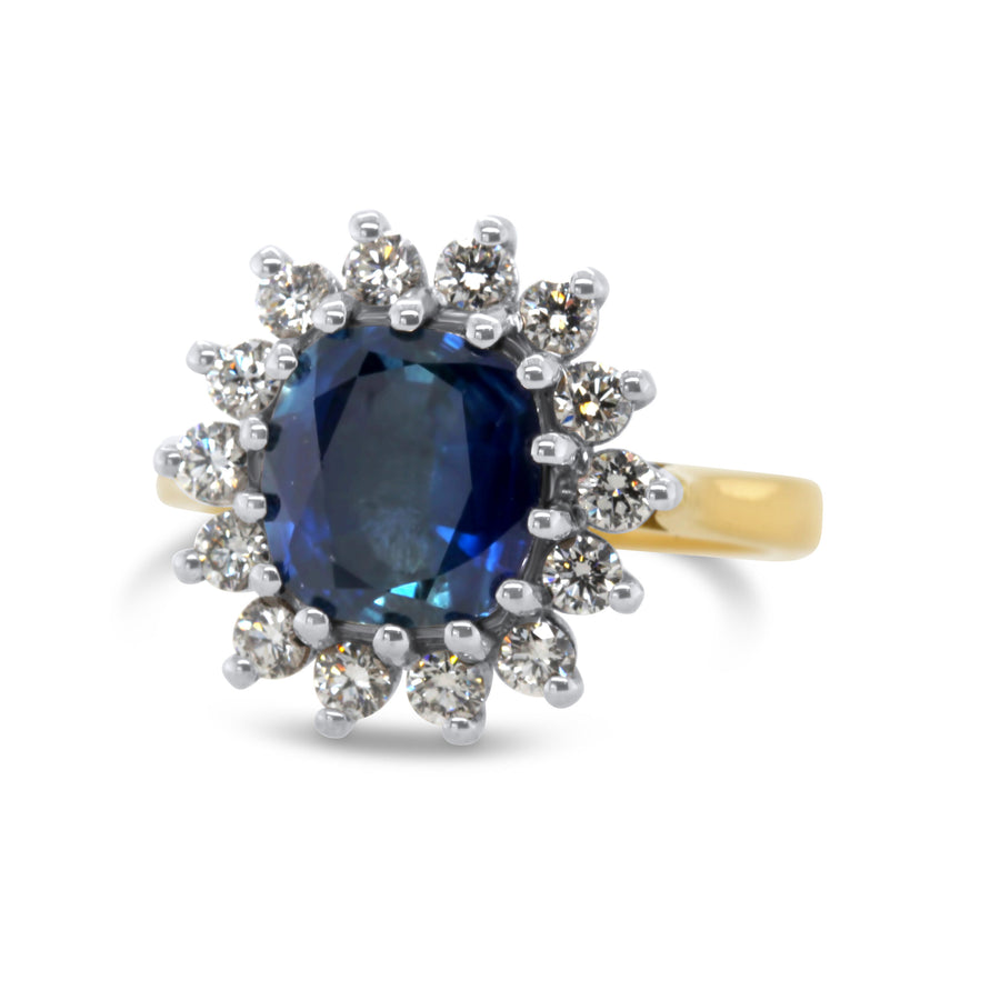 Cushion cut sapphire and diamond cluster ring by Ronan Campbell at Designyard contemporary jewellery gallery dublin ireland