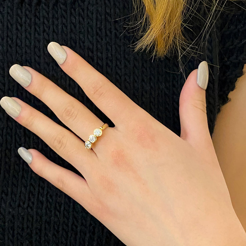 Photograph 2 of Rudolf Heltzel's Contemporary 18k Yellow Gold Bezel Set Three Diamond Engagement Ring. Available on DESIGNYARD.com and in our Jewellery Shop Dublin, Ireland. Free Worldwide Shipping with DHL.