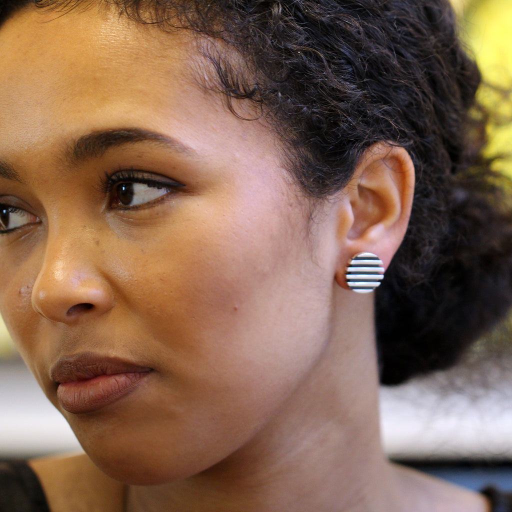Photograph 2 of Sarah Herriot's Contemporary Silver Oxidised Escalator Stud Statement Earrings. Available on DESIGNYARD.com and in our Jewellery Shop Dublin, Ireland. Free Worldwide Shipping with DHL.