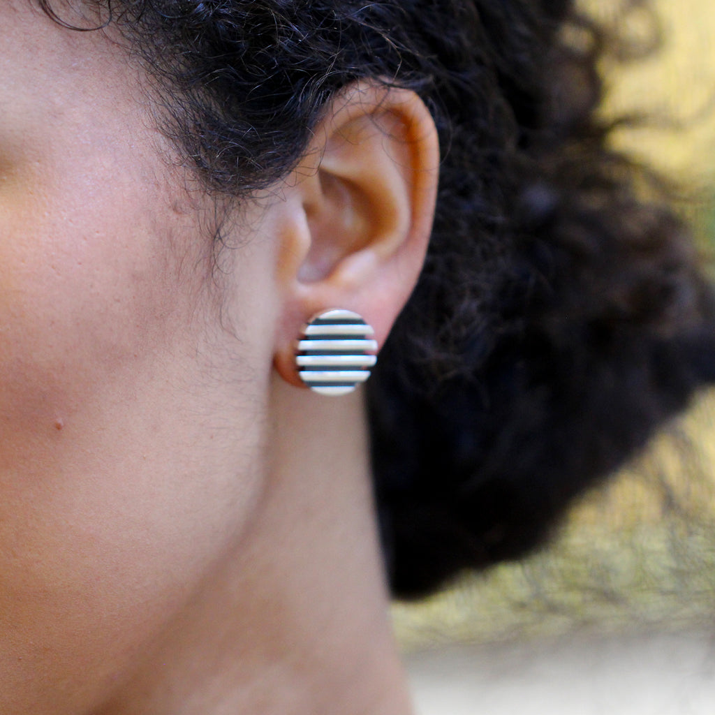 Photograph 3 of Sarah Herriot's Contemporary Silver Oxidised Escalator Stud Statement Earrings. Available on DESIGNYARD.com and in our Jewellery Shop Dublin, Ireland. Free Worldwide Shipping with DHL.