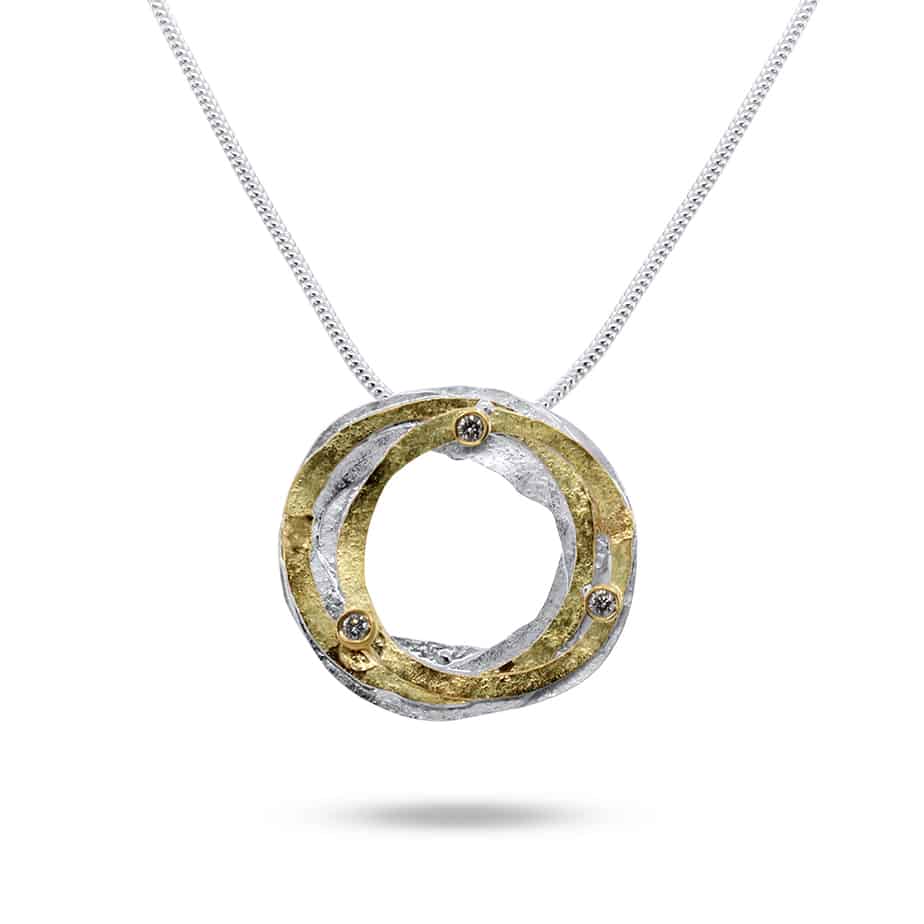 Photograph 1 of Shimara Carlow's Contemporary Sterling Silver 18k Yellow Gold Diamond Wrap Pendant. Available on DESIGNYARD.com and in our Jewellery Shop Dublin, Ireland. Free worldwide Shipping with DHL.