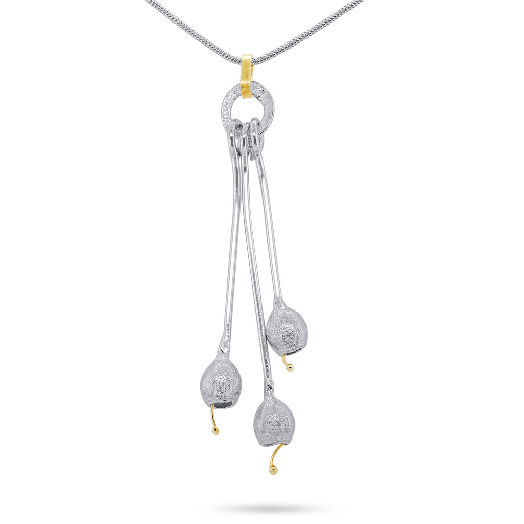 Photograph 1 of Shimara Carlow's Contemporary Sterling Silver 18k Yellow Gold Gum Nut Pendant. Available on  DESIGNYARD.com and in our Jewellery Shop Dublin, Ireland. Free Worldwide Shipping with DHL.