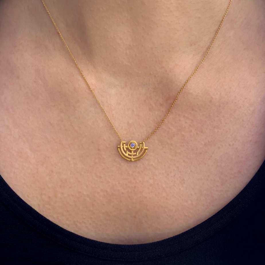 Photograph 2 of Shimell And Madden's Contemporary 18k Yellow Gold Half Circle Medium Blue Sapphire Pendant. Available on DESIGNYARD.com and in our Jewellery Shop Dublin, Ireland. Free Worldwide Shipping with DHL.
