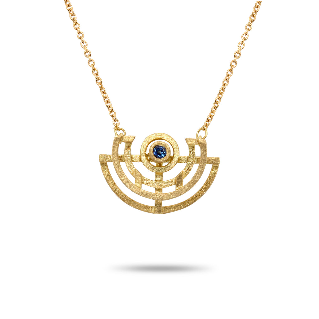 Photograph 1 of Shimell And Madden's Contemporary 18k Yellow Gold Half Circle Medium Blue Sapphire Pendant. Available on DESIGNYARD.com and in our Jewellery Shop Dublin, Ireland. Free Worldwide Shipping with DHL.