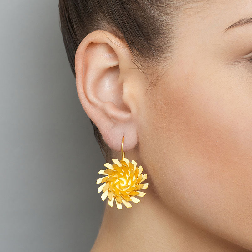 Photograph 2 of Sophia Epp's Contemporary Silver 22k Gold Plate Wirbel Drop Statement Earrings. Available on DESIGNYARD.com and in our Jewellery Shop Dublin, Ireland. Free Worldwide Shipping with DHL.