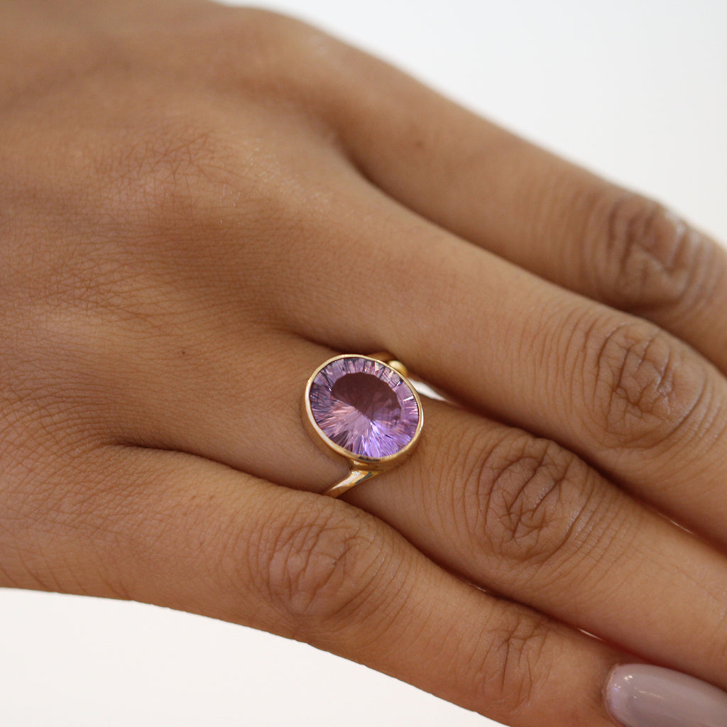 Photograph 2 of Stephanie Robinson's Contemporary 14k Yellow Gold Concave Amethyst Statement Ring. Available on DESIGNYARD.com and in our Jewellery Shop Dublin, Ireland. Free Worldwide Shipping with DHL.