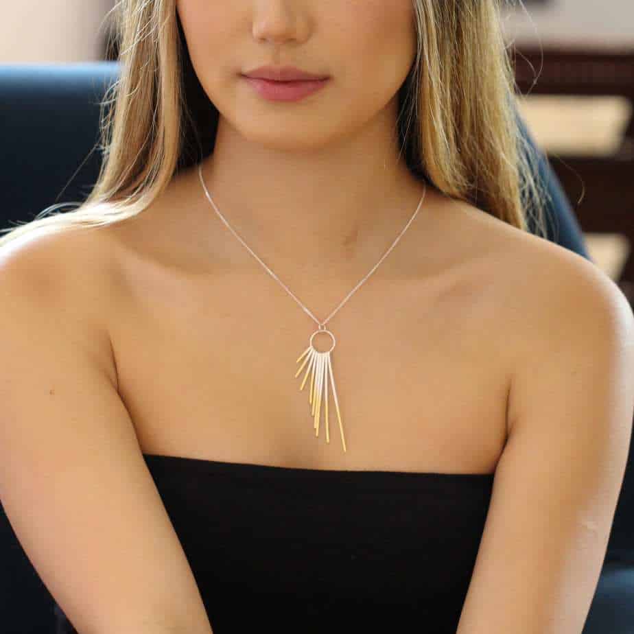 Photograph 3 of Kokkino's Shimmer Cascade Silver & Yellow Gold Necklace. Available on DESIGNYARD.com and in our Contemporary Jewellery Shop Dublin, Ireland. Free Shipping Worldwide with DHL.