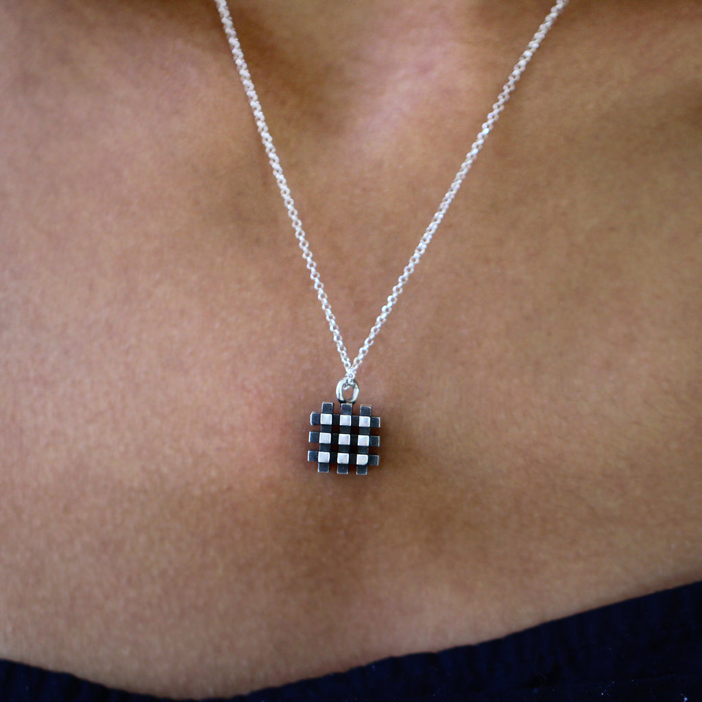 Photograph 3 of Vanessa Ree's Contemporary Sterling Silver Oxi 3D# Negative Small Pendant. Available on DESIGNYARD.com and in our Jewellery Shop Dublin, Ireland. Free Worldwide Shipping with DHL.