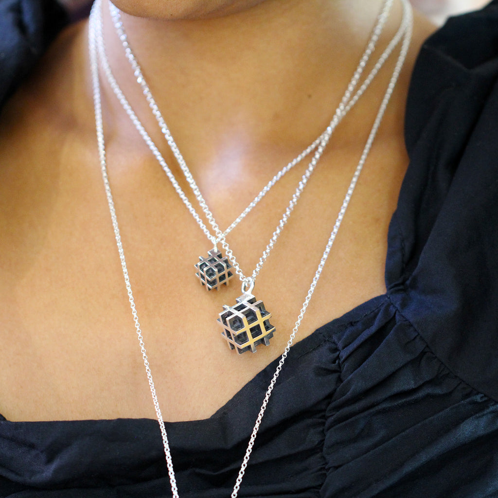 Photograph 3 of Vanessa Ree's Contemporary Sterling Silver Oxi 3D# Positive Large Pendant. Available on DESIGNYARD.com and in our Jewellery Shop Dublin, Ireland. Free Worldwide Shipping with DHL.