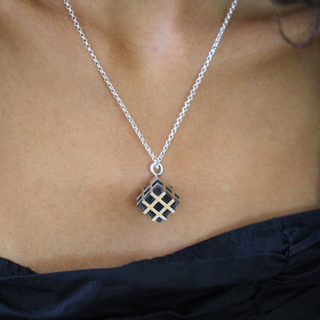 Photograph 2 of Vanessa Ree's Contemporary Sterling Silver Oxi 3D# Positive Large Pendant. Available on DESIGNYARD.com and in our Jewellery Shop Dublin, Ireland. Free Worldwide Shipping with DHL.